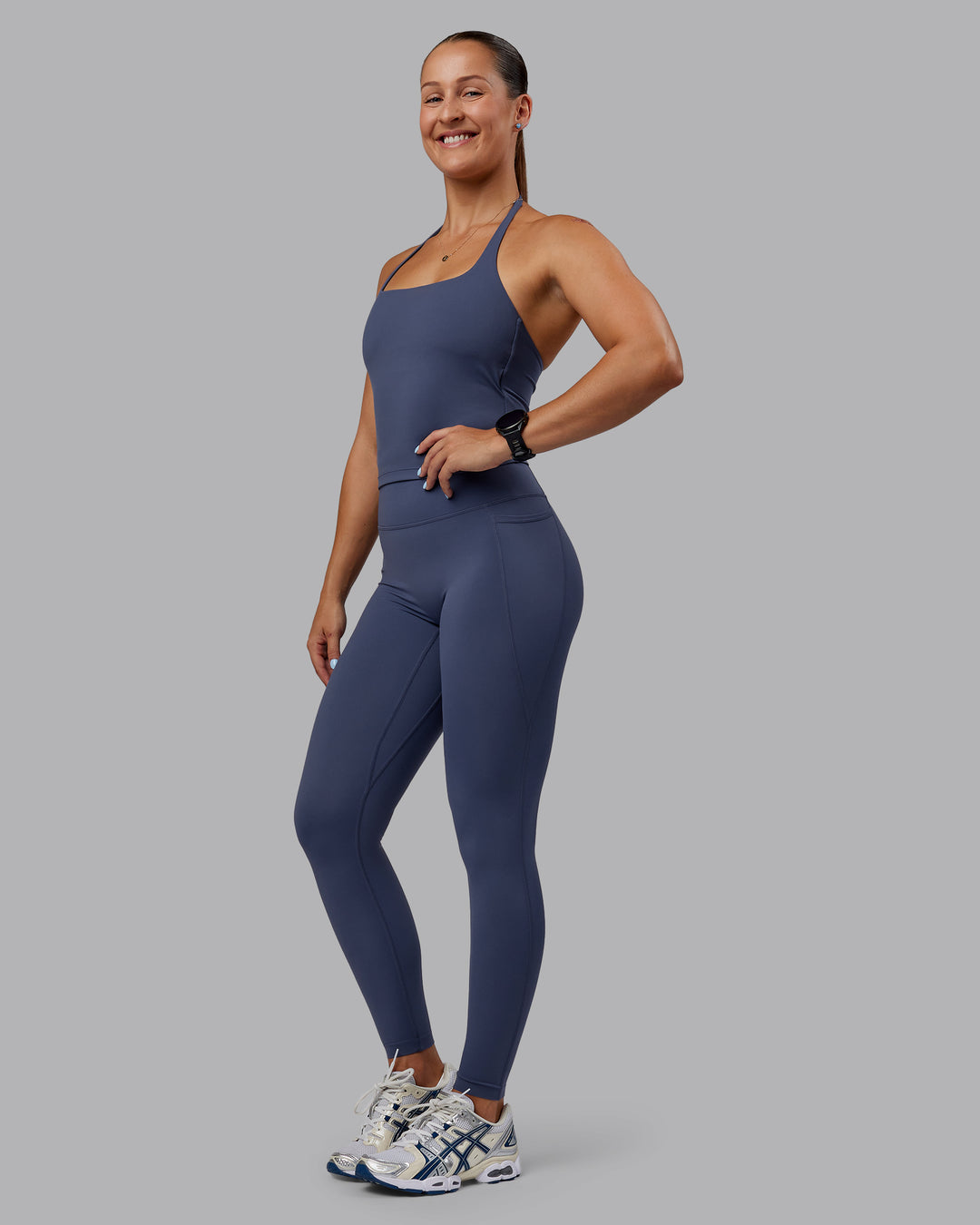 Woman wearing Abs Elixir Ultra High-Rise Full Length Legging Pockets - Nightshadow Blue