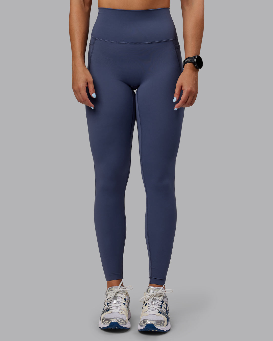 Woman wearing Abs Elixir Ultra High-Rise Full Length Legging Pockets - Nightshadow Blue