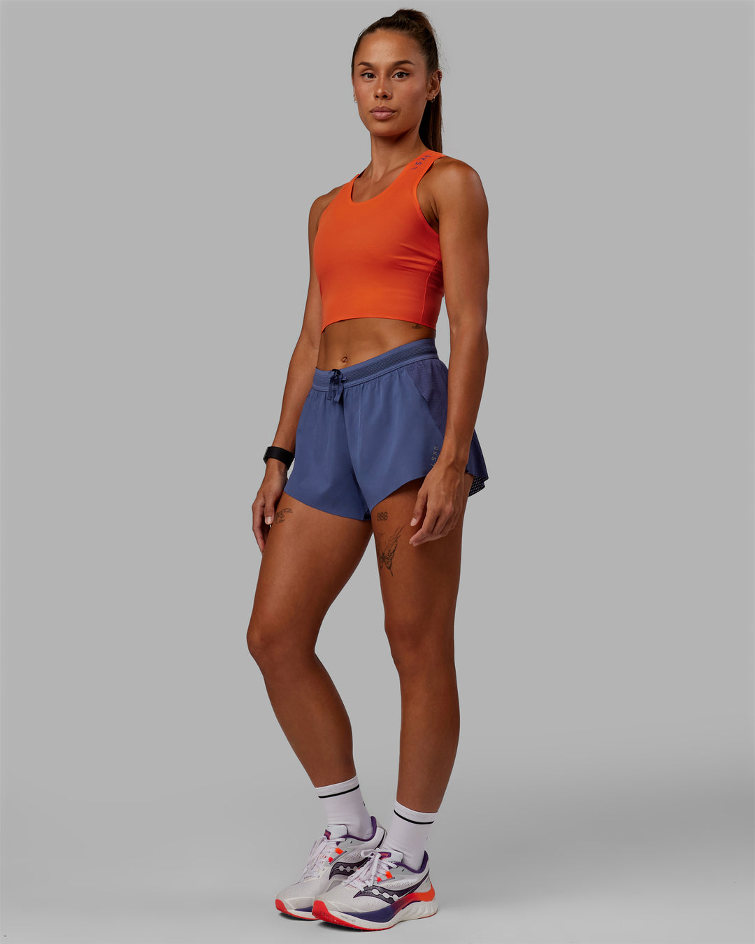 Woman wearing Accelerate Run Shorts - Future Dusk