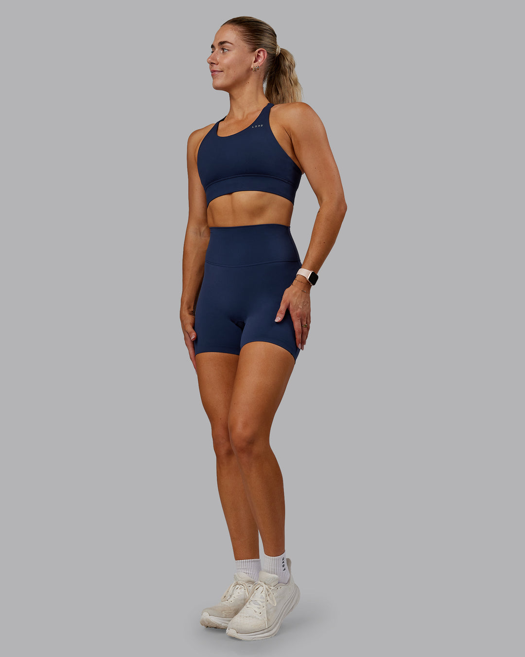 Woman wearing Accelerate Sports Bra - Future Navy | Model:Hannah | Size:S