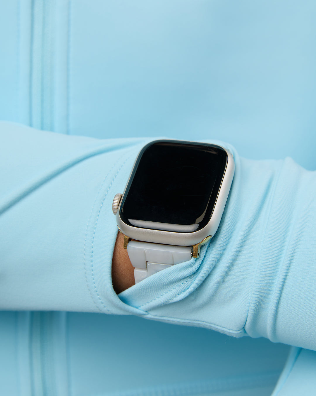 Woman wearing Aspire Jacket - Crystal Blue