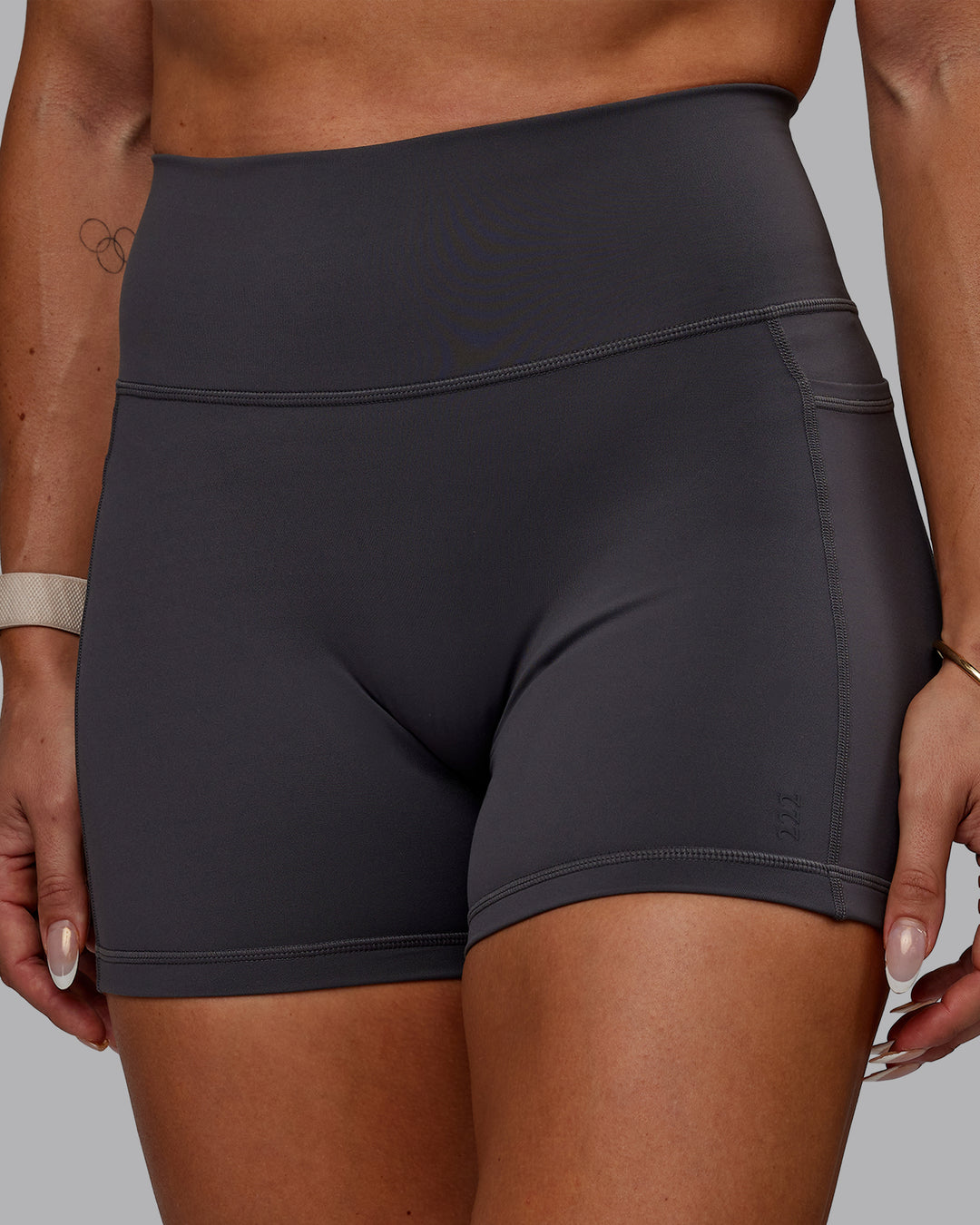 Woman wearing Bree Masters Fusion Ultra High-Rise 4" Short Pockets - Stormy