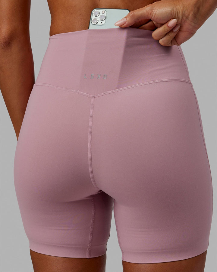 Woman wearing Elixir Mid Short Tights - Cosmetic Pink