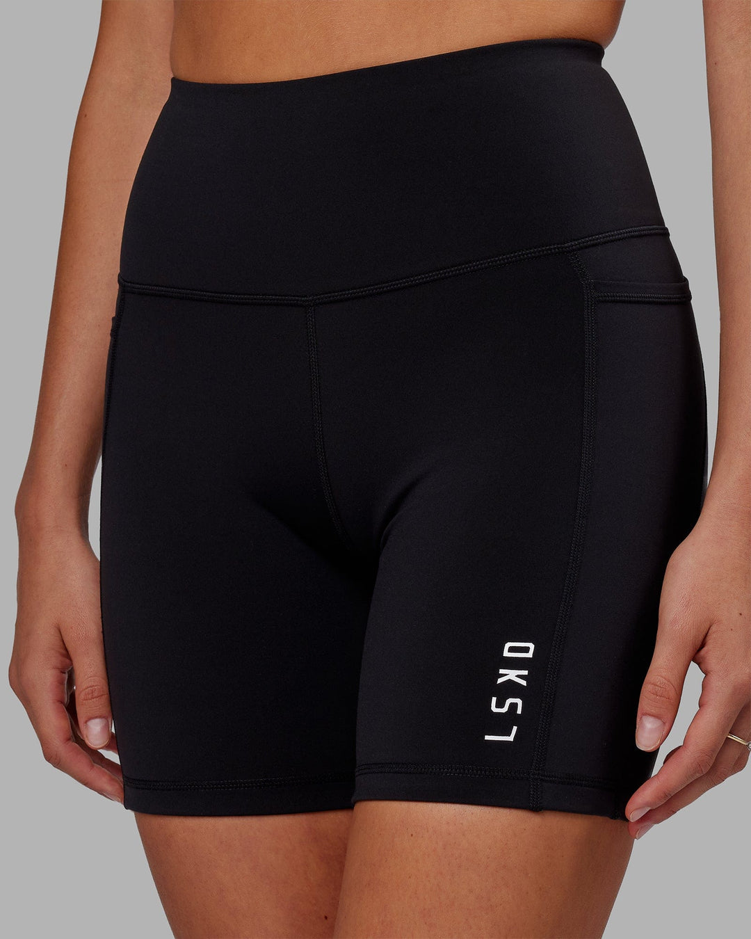 Woman wearing Flux Ultra High-Rise 6" Short Pockets - Black