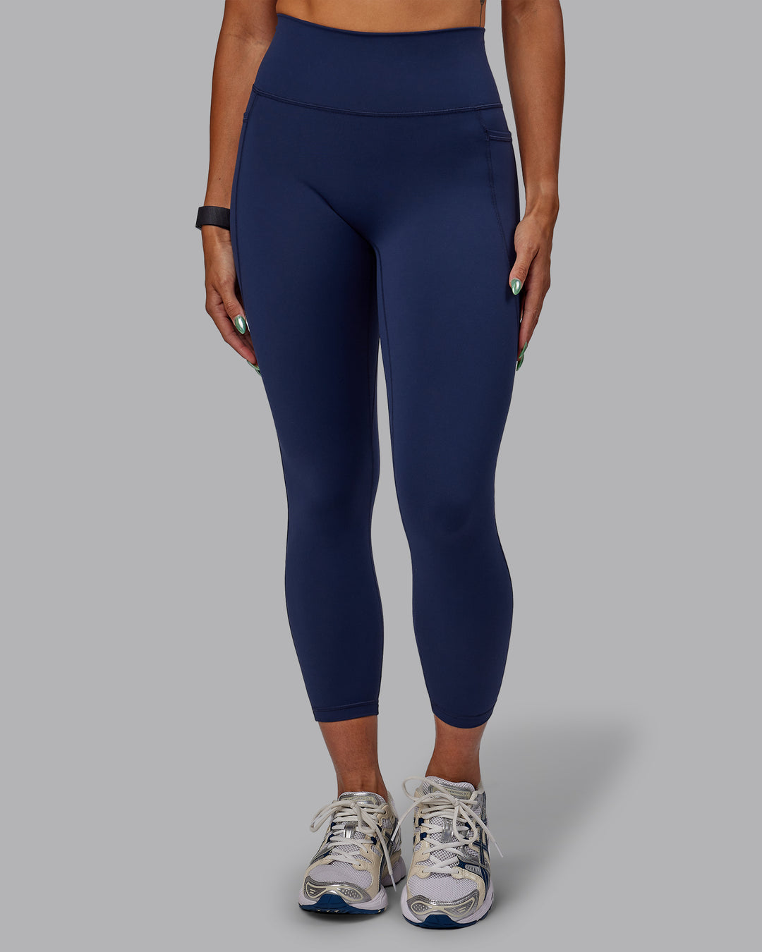 Woman wearing Fusion Ultra High-Rise 7/8 Legging Pockets - Future Navy | Model:Vanessa | Size:S