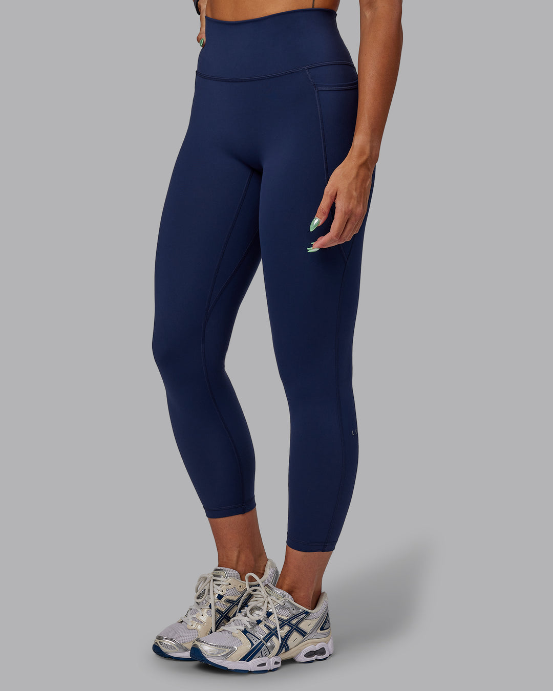 Woman wearing Fusion Ultra High-Rise 7/8 Legging Pockets - Future Navy | Model:Vanessa | Size:S