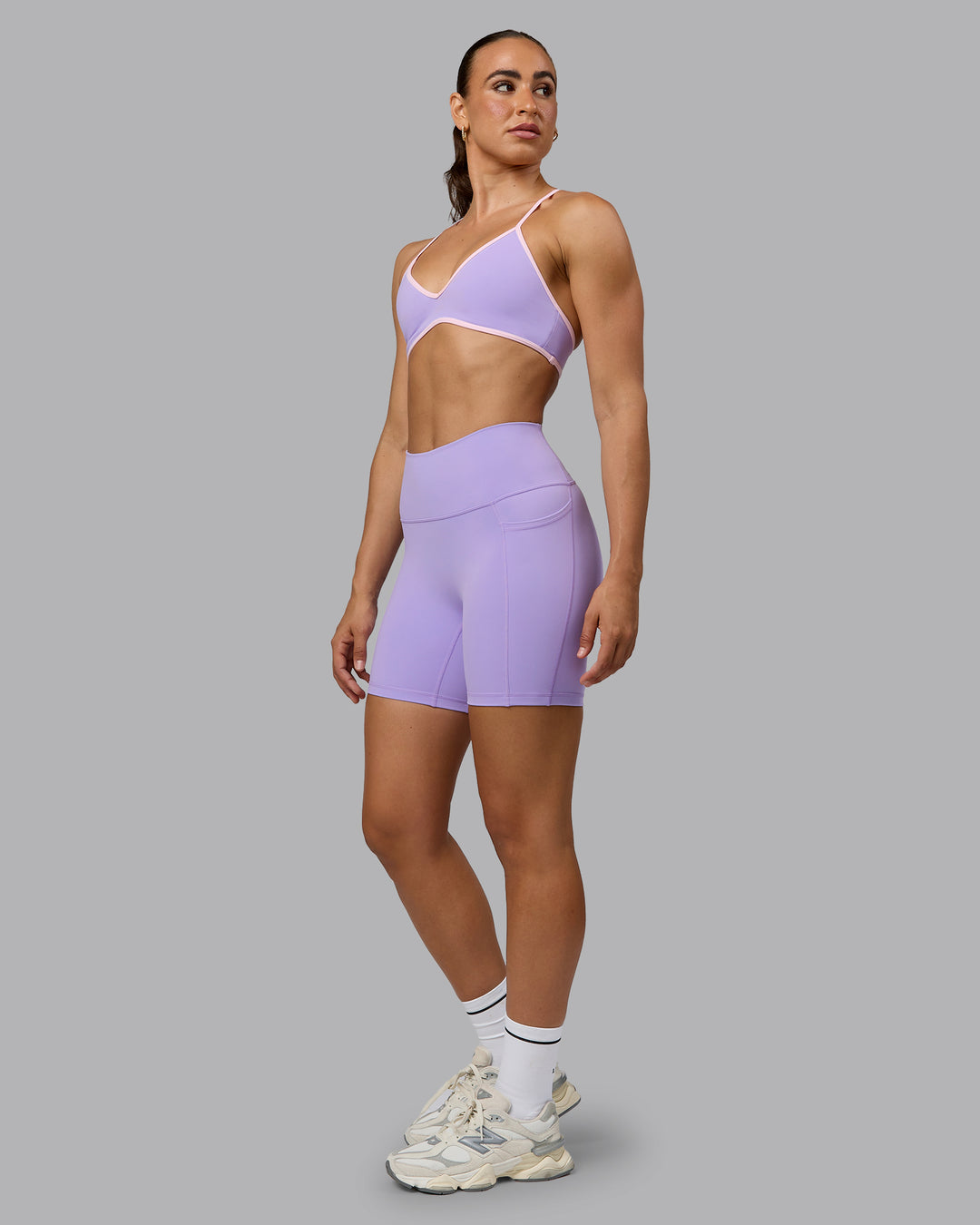 Woman wearing Fusion Ultra High-Rise 6" Short Pockets - Pale Lilac | Model:Sophie | Size:S