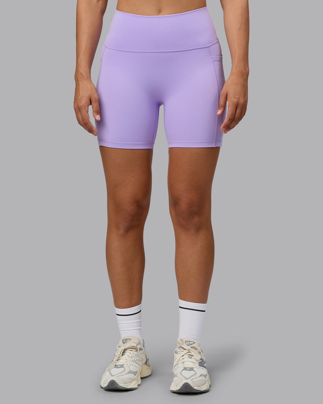 Woman wearing Fusion Ultra High-Rise 6" Short Pockets - Pale Lilac | Model:Sophie | Size:S