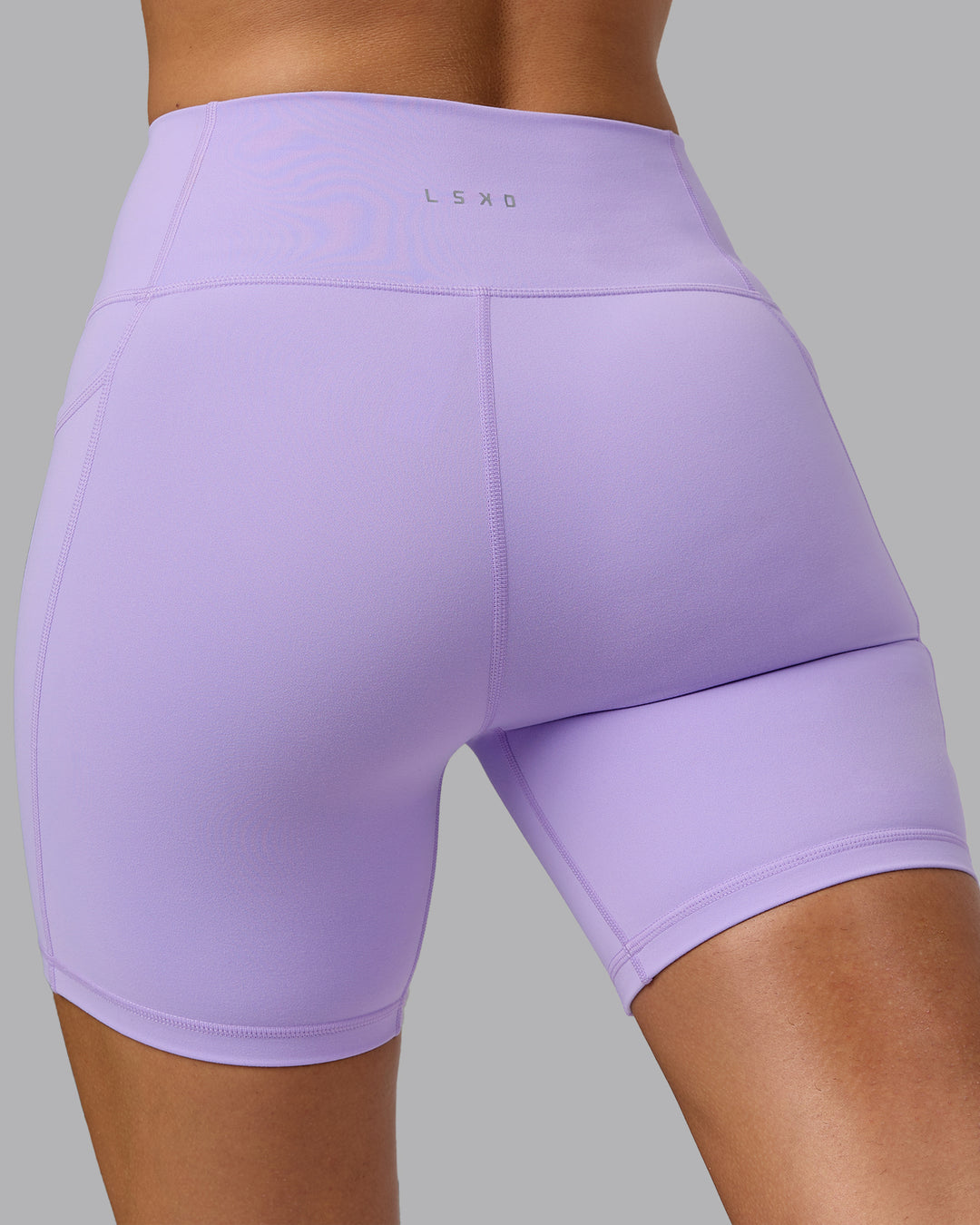 Woman wearing Fusion Ultra High-Rise 6" Short Pockets - Pale Lilac | Model:Sophie | Size:S