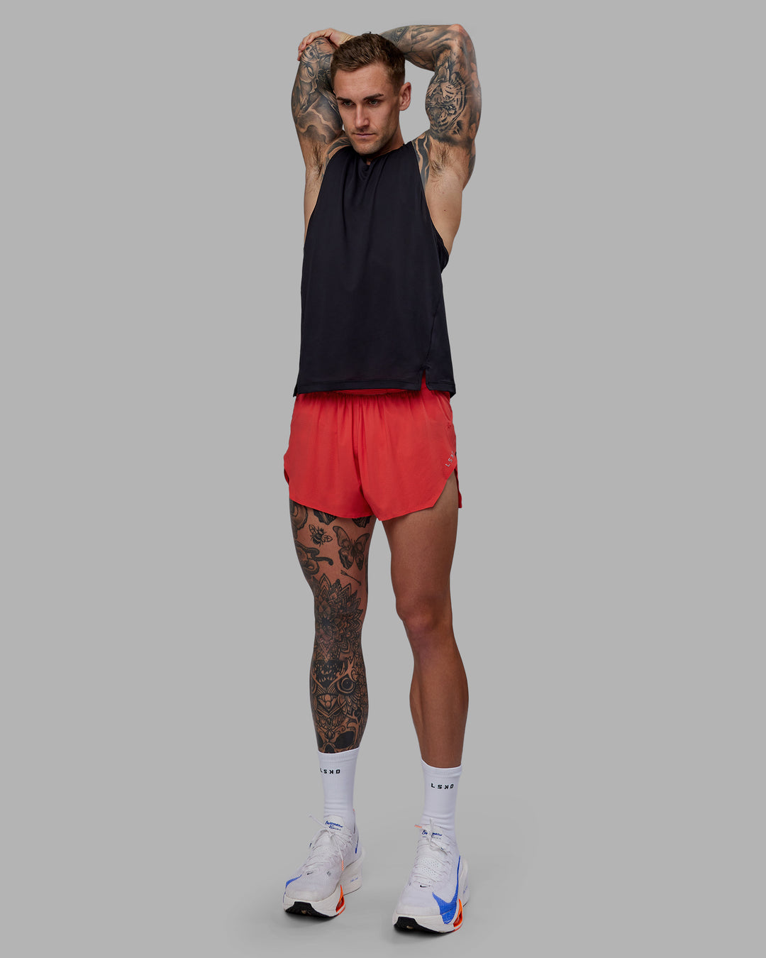 Man wearing Race Day 3" Lined Running Shorts - Cayenne