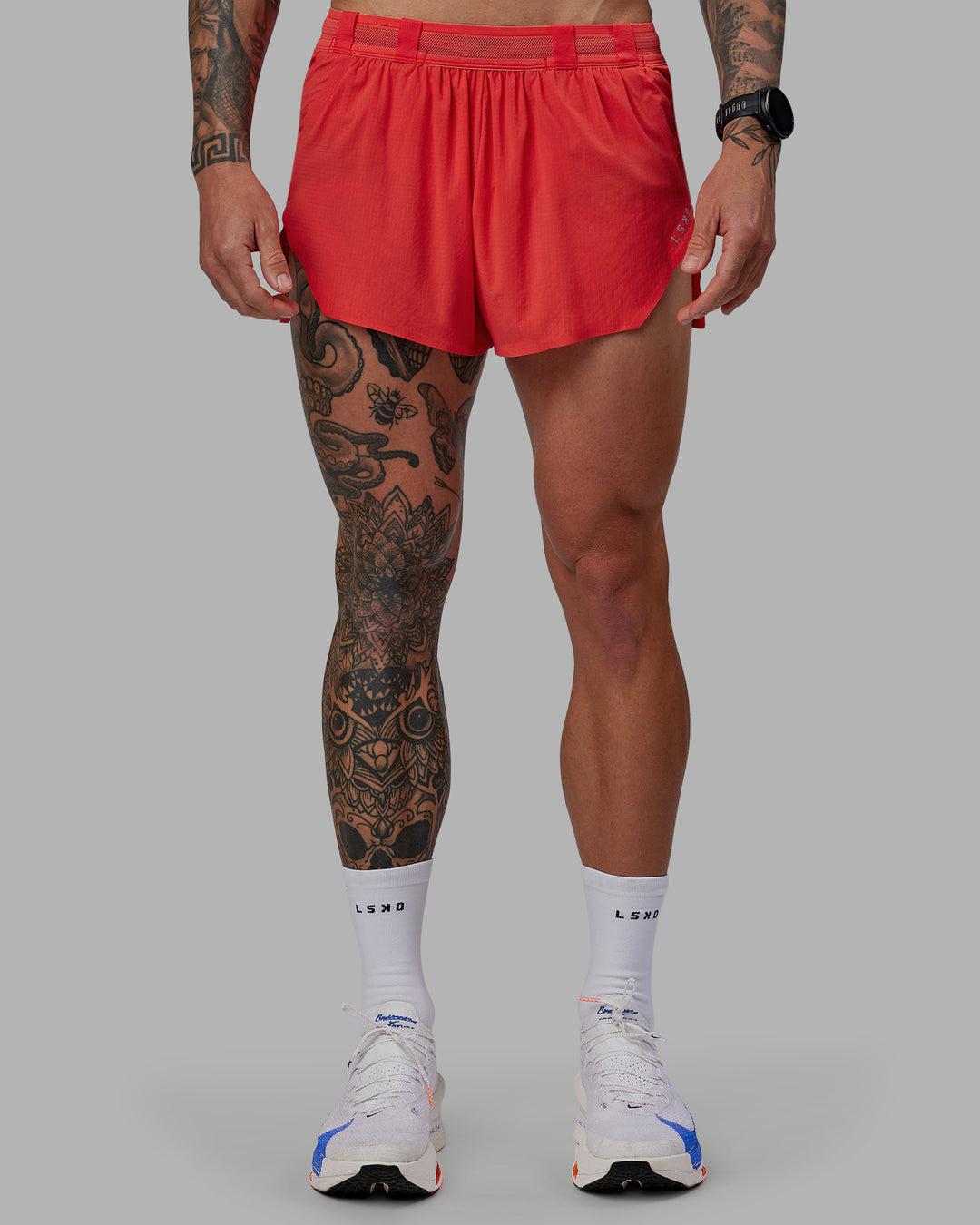 Man wearing Race Day 3" Lined Running Shorts - Cayenne