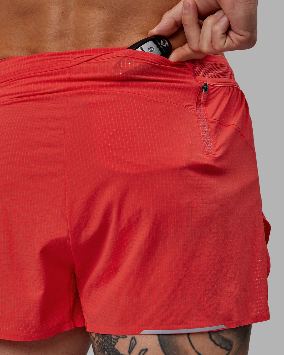 Man wearing Race Day 3" Lined Running Shorts - Cayenne