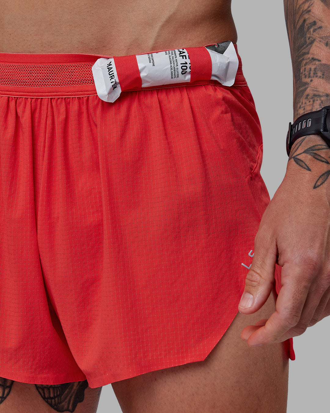 Man wearing Race Day 3" Lined Running Shorts - Cayenne