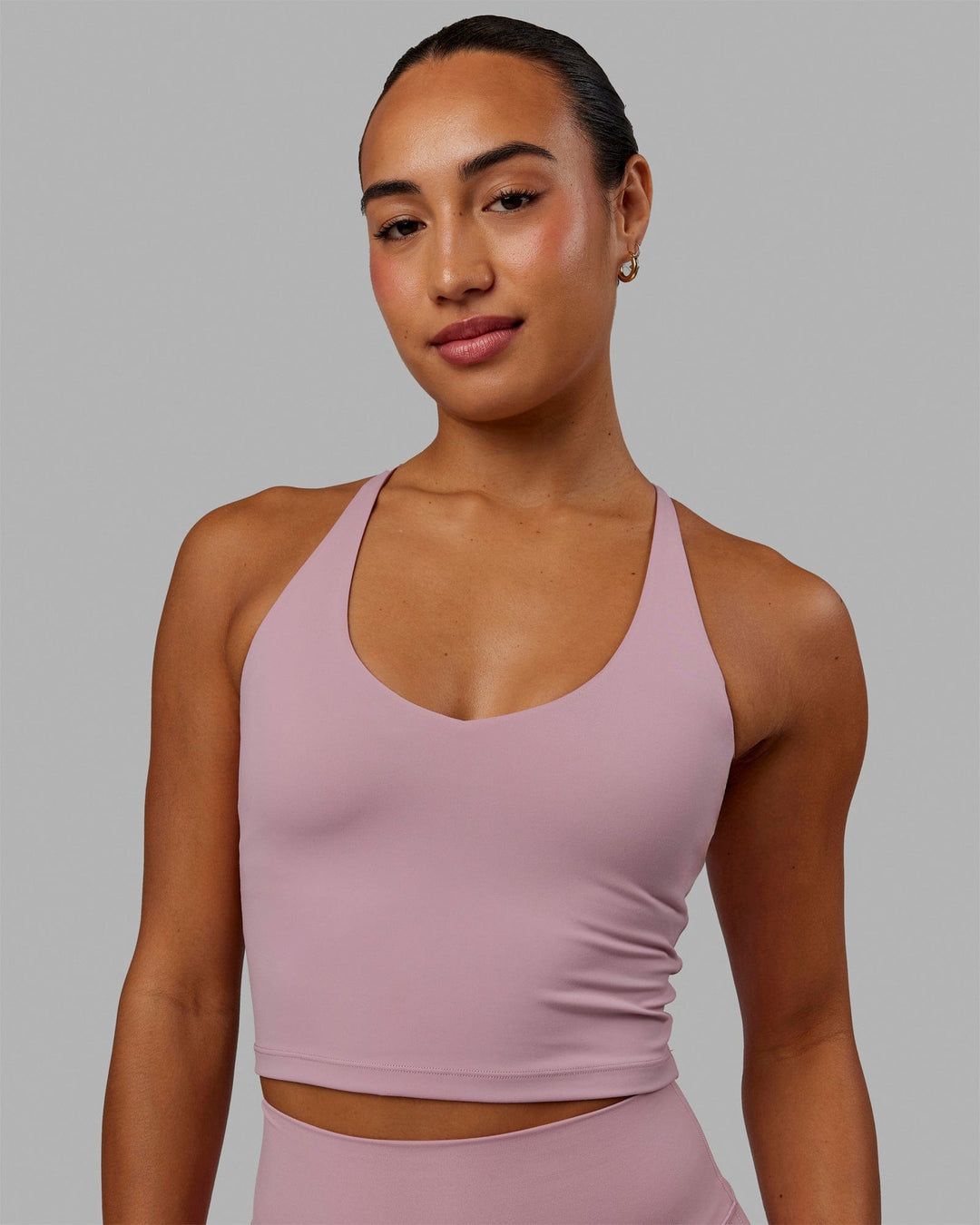 Woman wearing Movement Active Tank - Cosmetic Pink