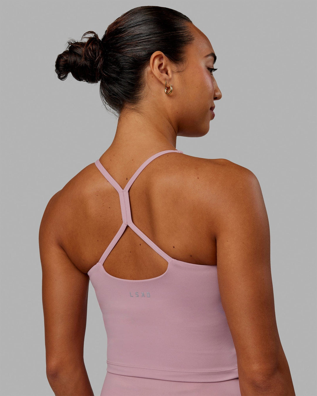 Woman wearing Movement Active Tank - Cosmetic Pink