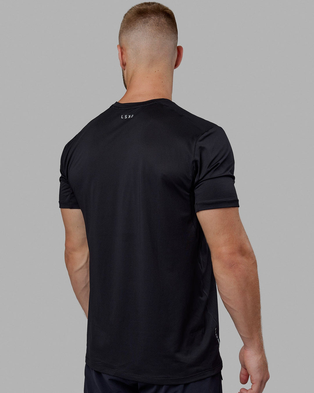 Man wearing Pace Running Tee - Black