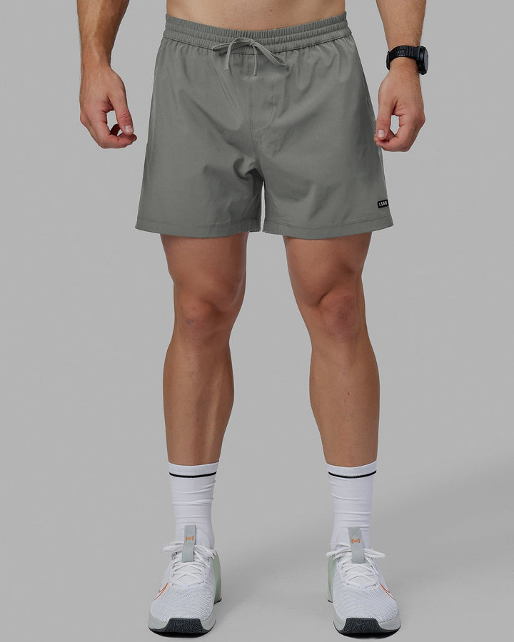 Man wearing Rep 5" Lined Performance Shorts - Graphite