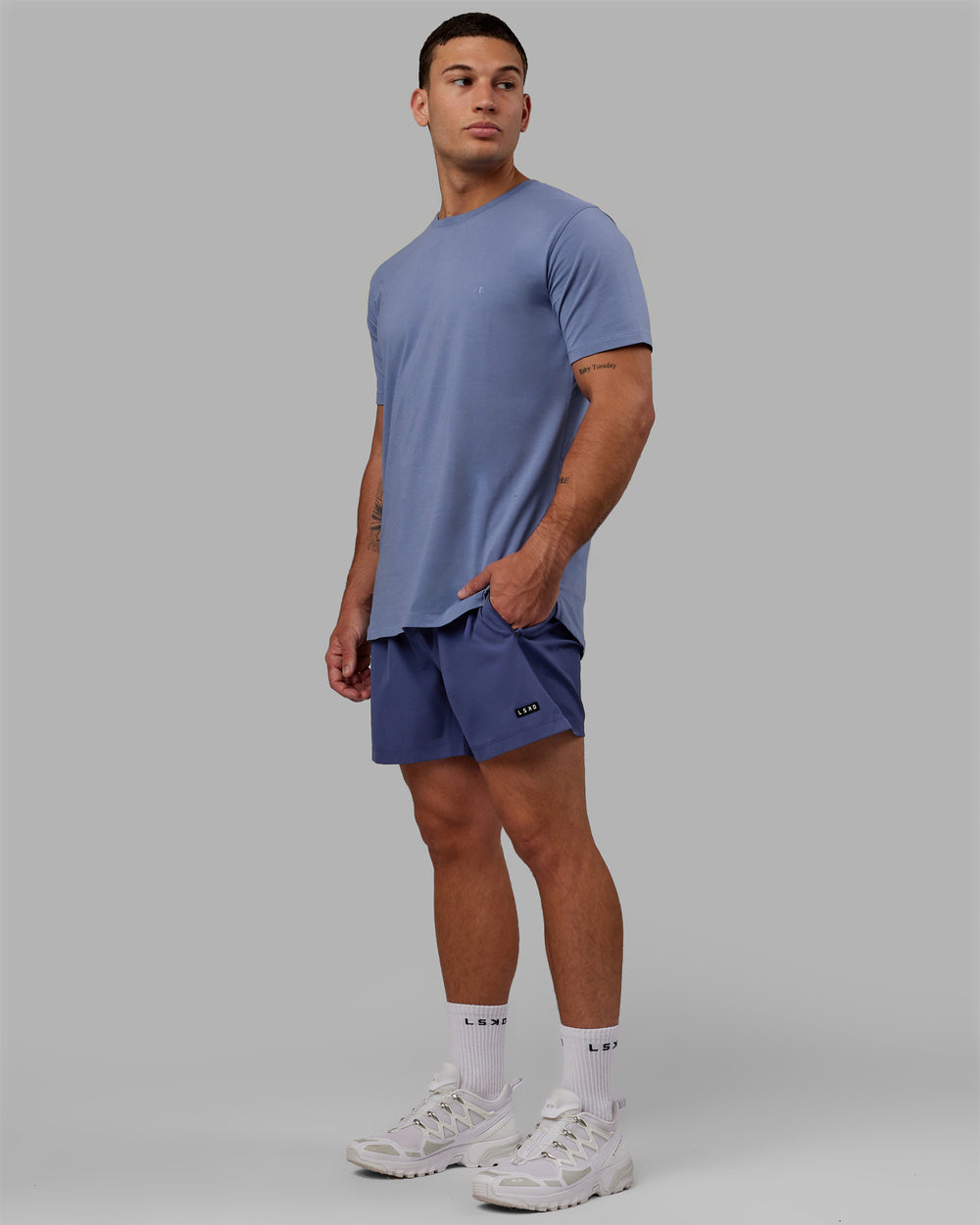 Man wearing Rep 5'' Performance Shorts - Future Dusk