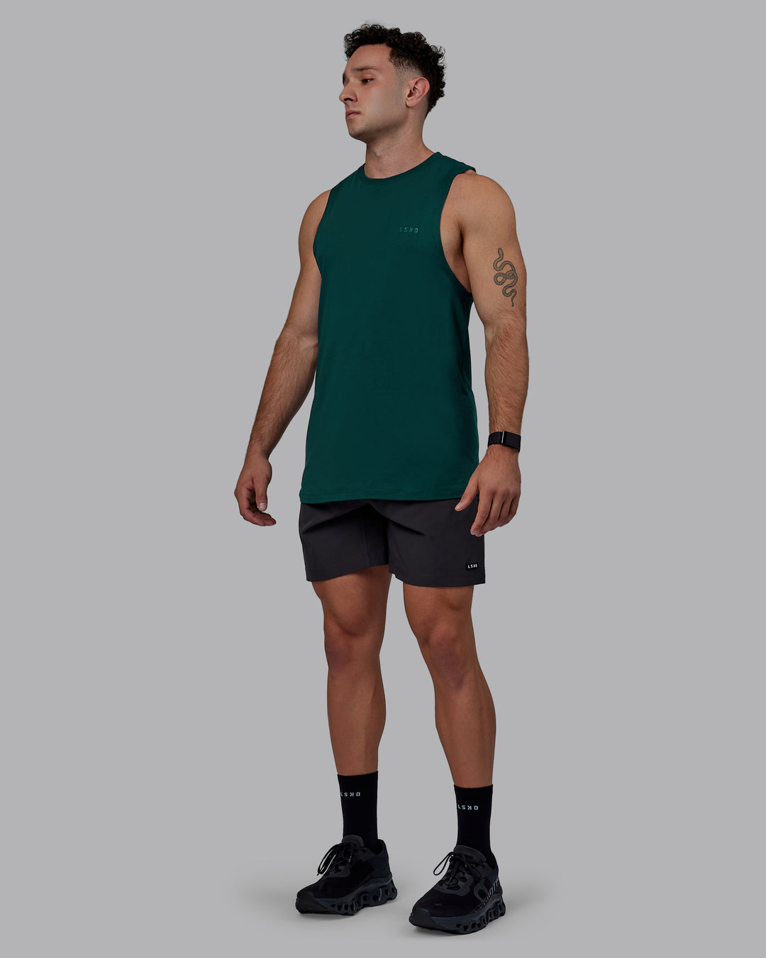 Man wearing Rep 7" Performance Shorts - Pirate Black