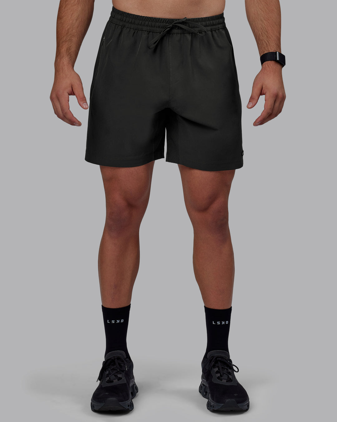 Man wearing Rep 7" Performance Shorts - Pirate Black
