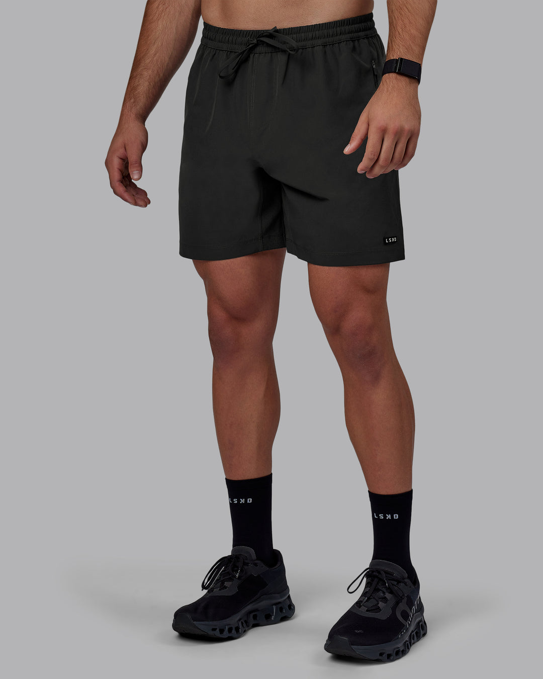 Man wearing Rep 7" Performance Shorts - Pirate Black