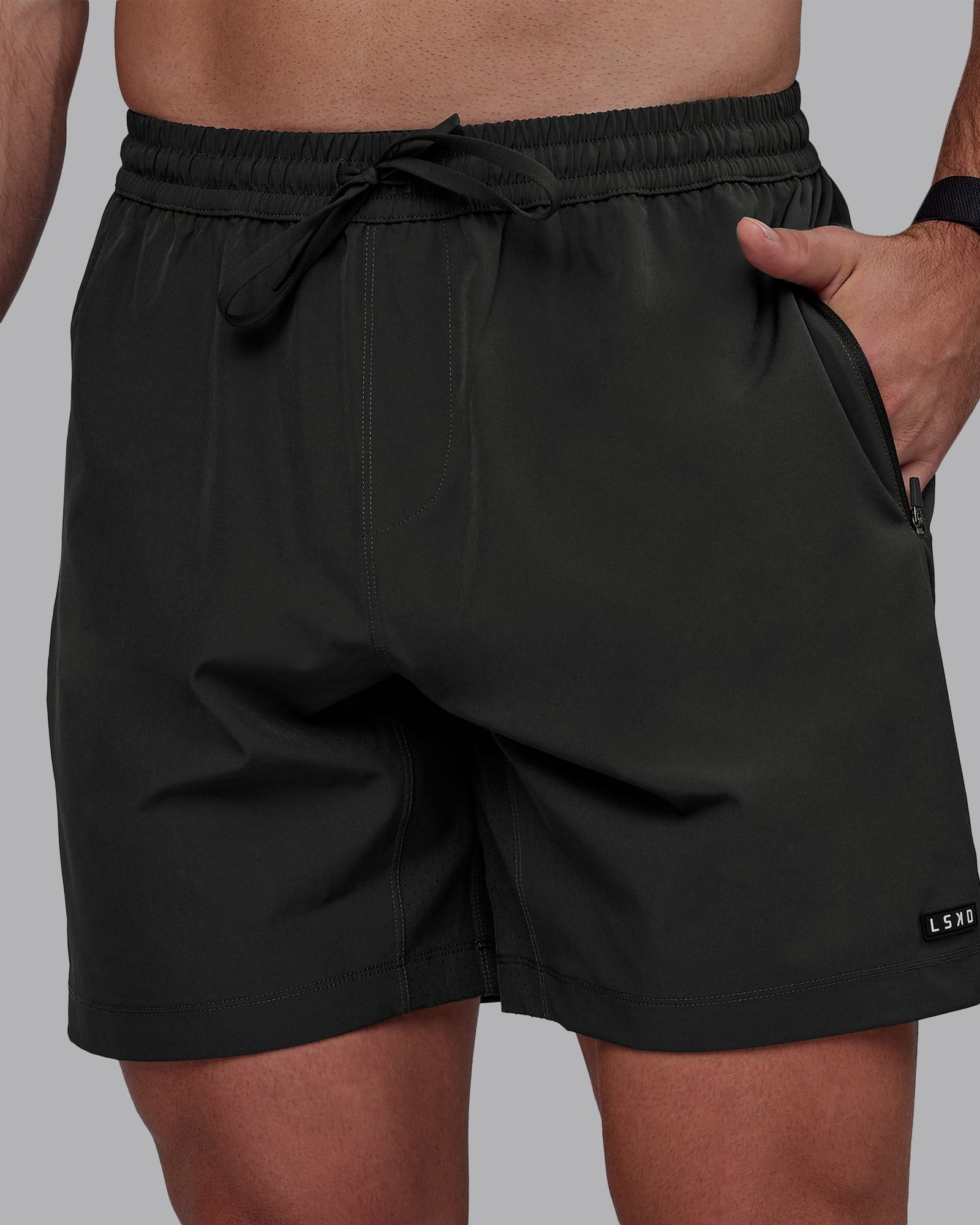 Man wearing Rep 7" Performance Shorts - Pirate Black