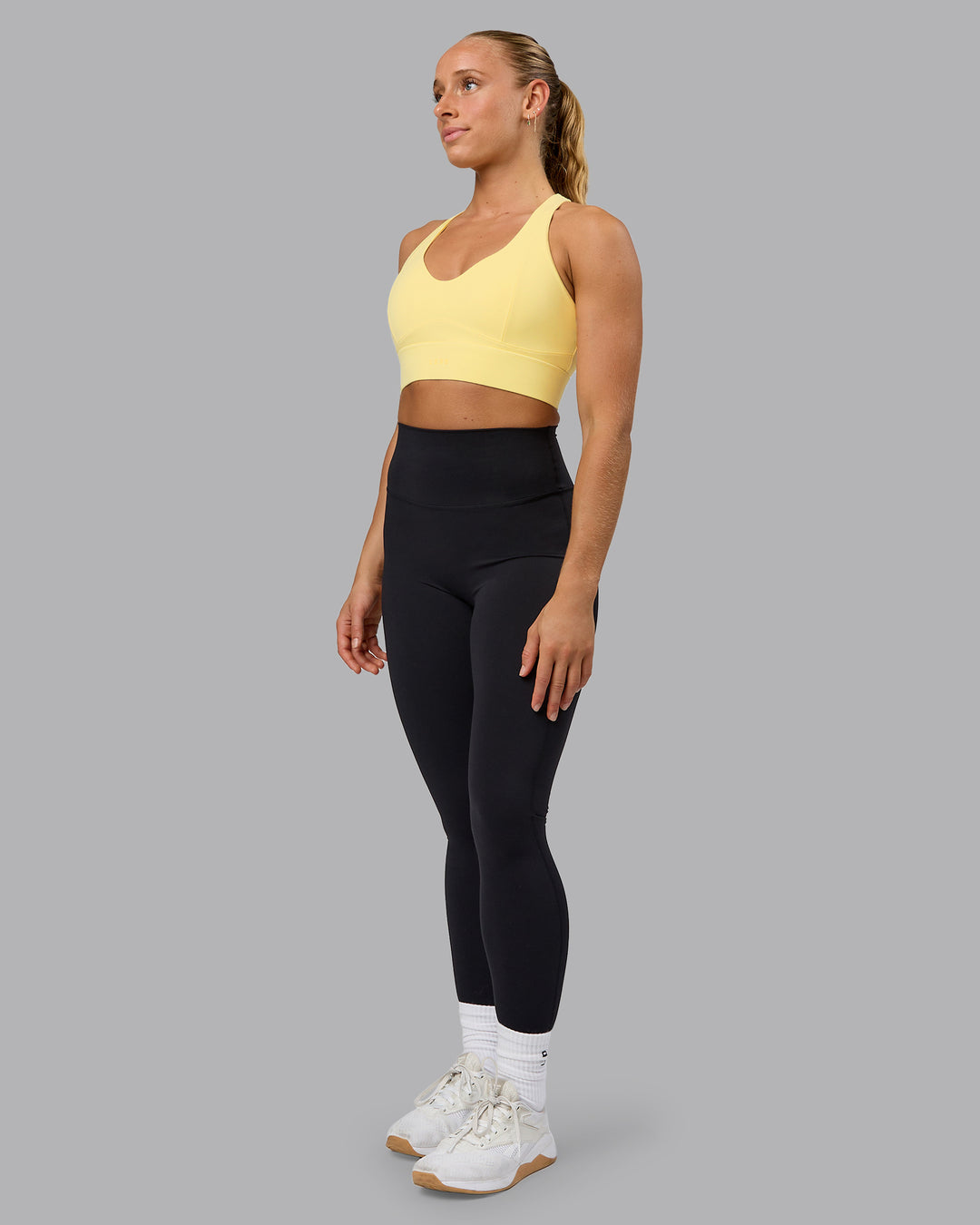 Woman wearing Sculpt Sports Bra - Lemon