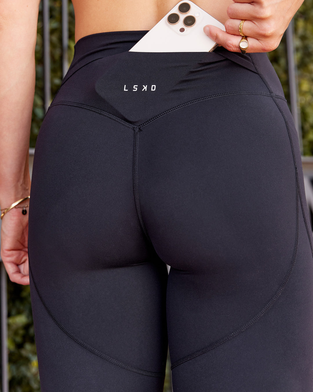 Woman wearing Elixir Defined High-Rise Full Length Legging Pockets - Black | Model:Shae | Size:S