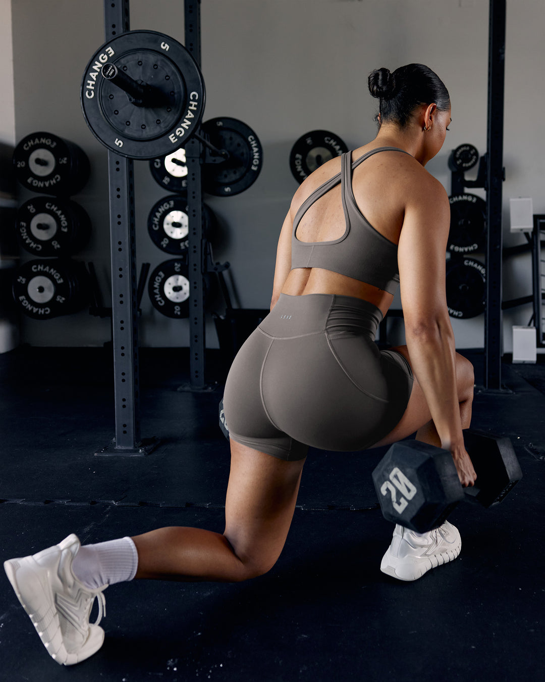 Woman wearing Fusion Ultra High-Rise 4" Short Pockets - Dark Storm | Model:Ayla | Size:S