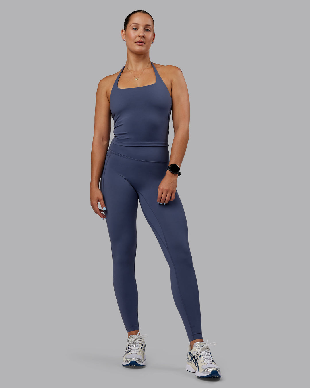 Woman wearing Abs Elixir Ultra High-Rise Full Length Legging Pockets - Nightshadow Blue