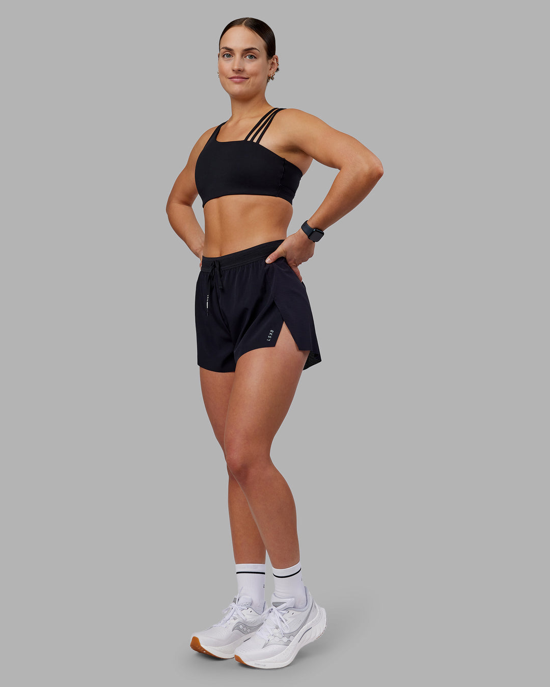 Woman wearing Accelerate 3" High-Rise Running Short - Black | Model:Keisha | Size:S