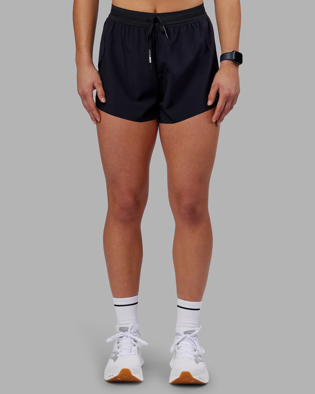Woman wearing Accelerate 3" High-Rise Running Short - Black | Model:Keisha | Size:S