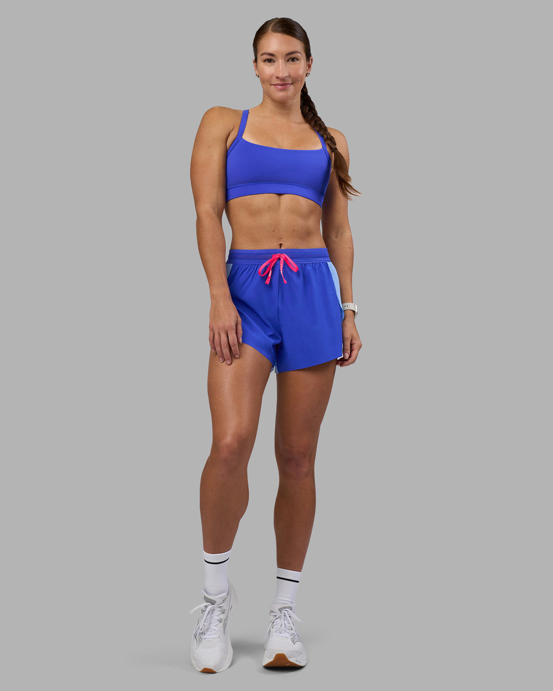 Woman wearing Accelerate 3" High-Rise Running Short - Power Cobalt-Open Air | Model:Hannah | Size:S