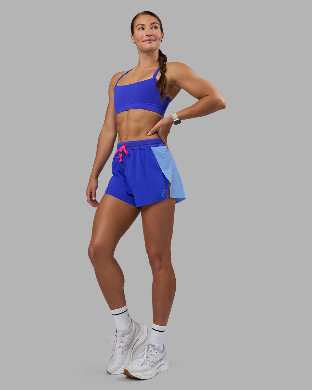 Woman wearing Accelerate 3" High-Rise Running Short - Power Cobalt-Open Air | Model:Hannah | Size:S