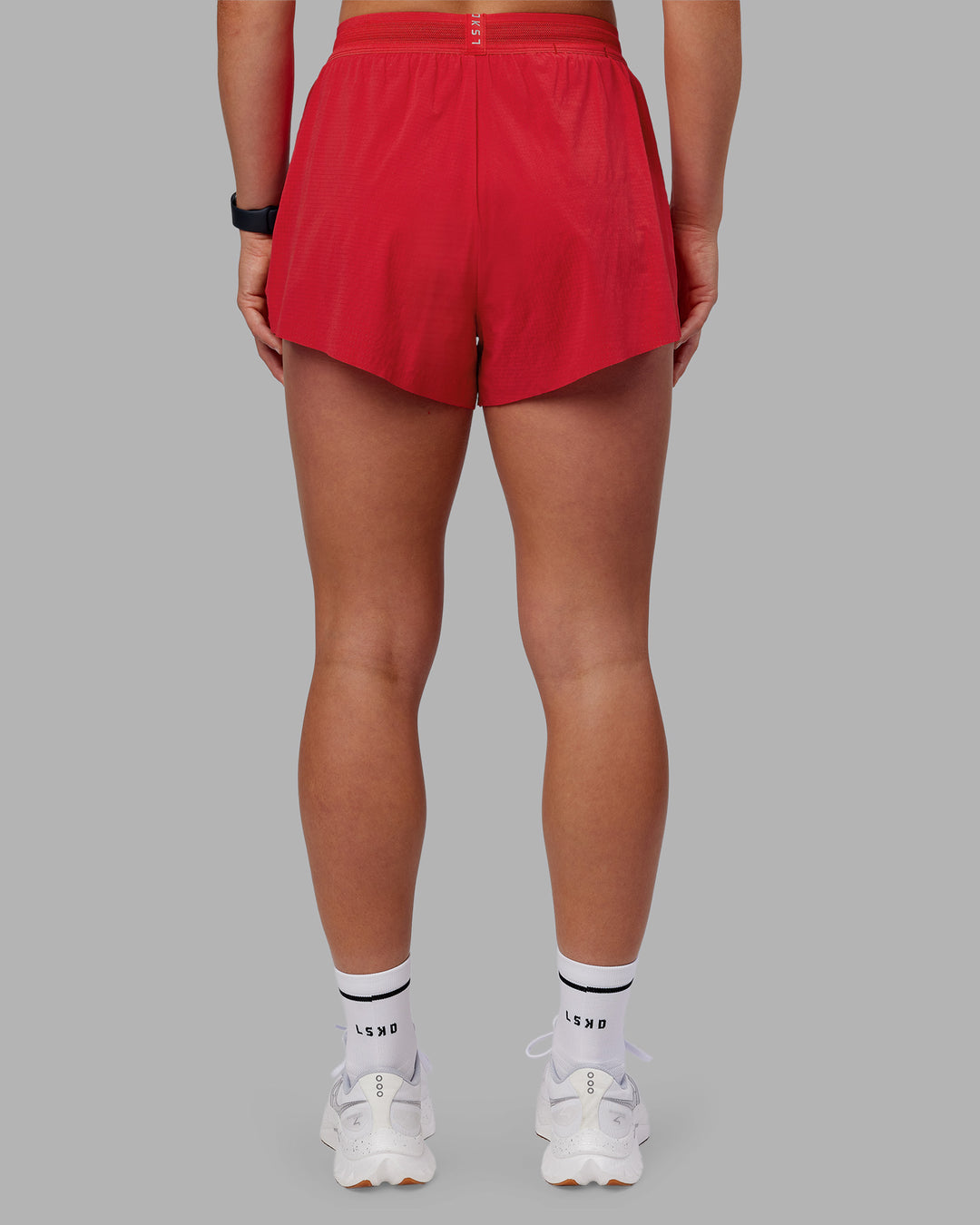 Woman wearing Accelerate 3" High-Rise Running Short - Scarlet | Model:Keisha | Size:S