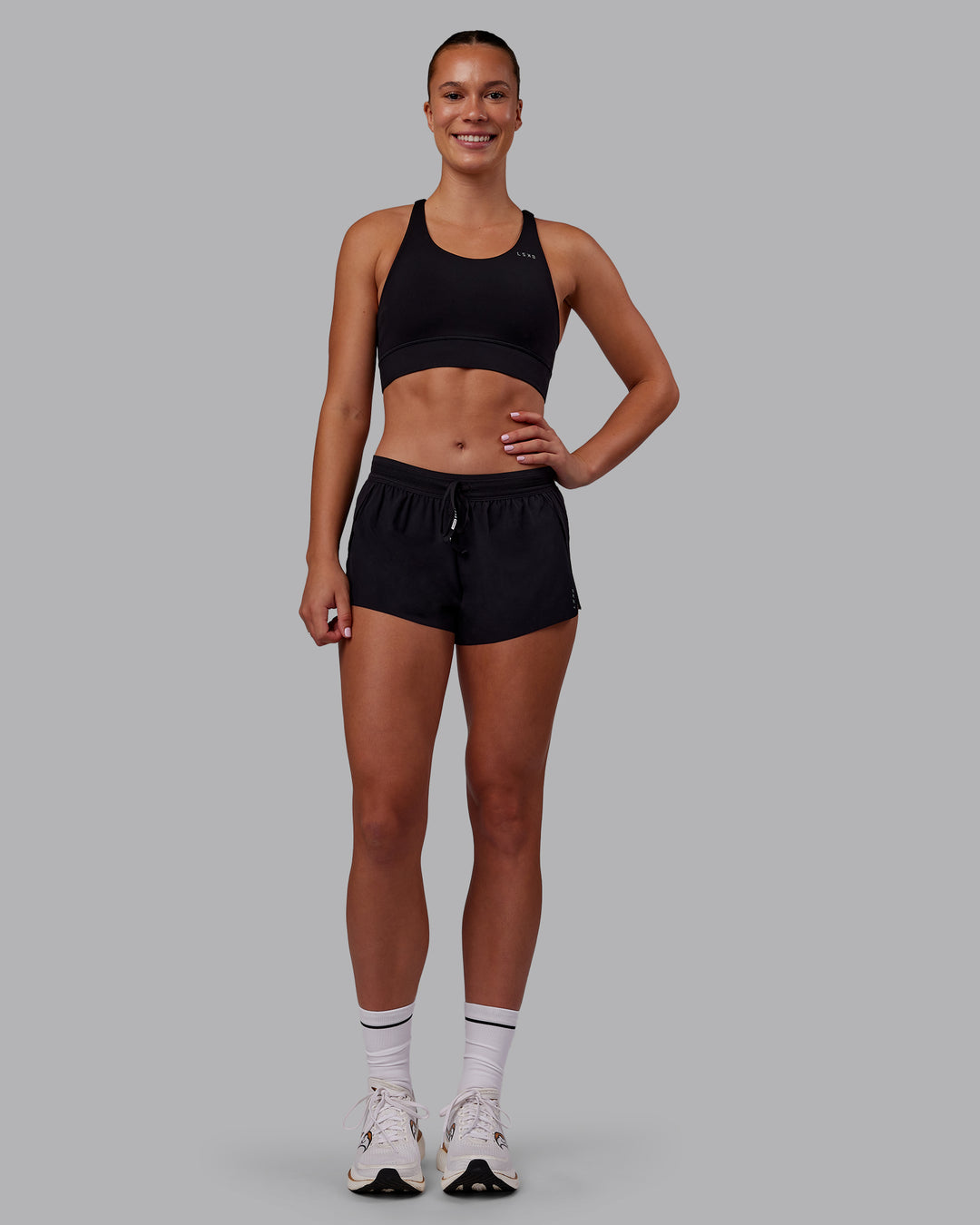 Woman wearing Accelerate 3" Running Short - Black | Model:Charlize | Size:S