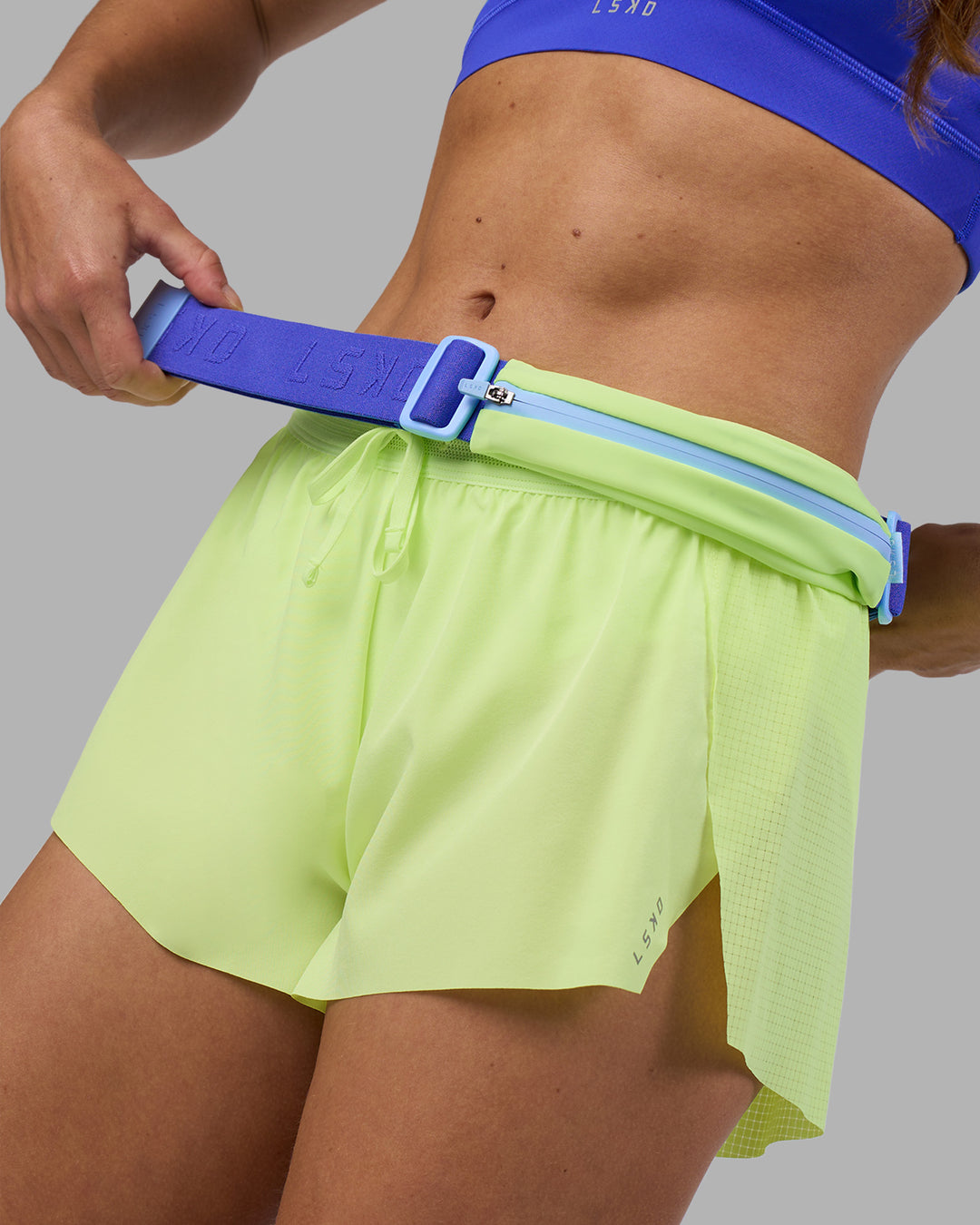 Woman wearing Accelerate 3" Running Short - Lime Glo | Model:Hannah | Size:S