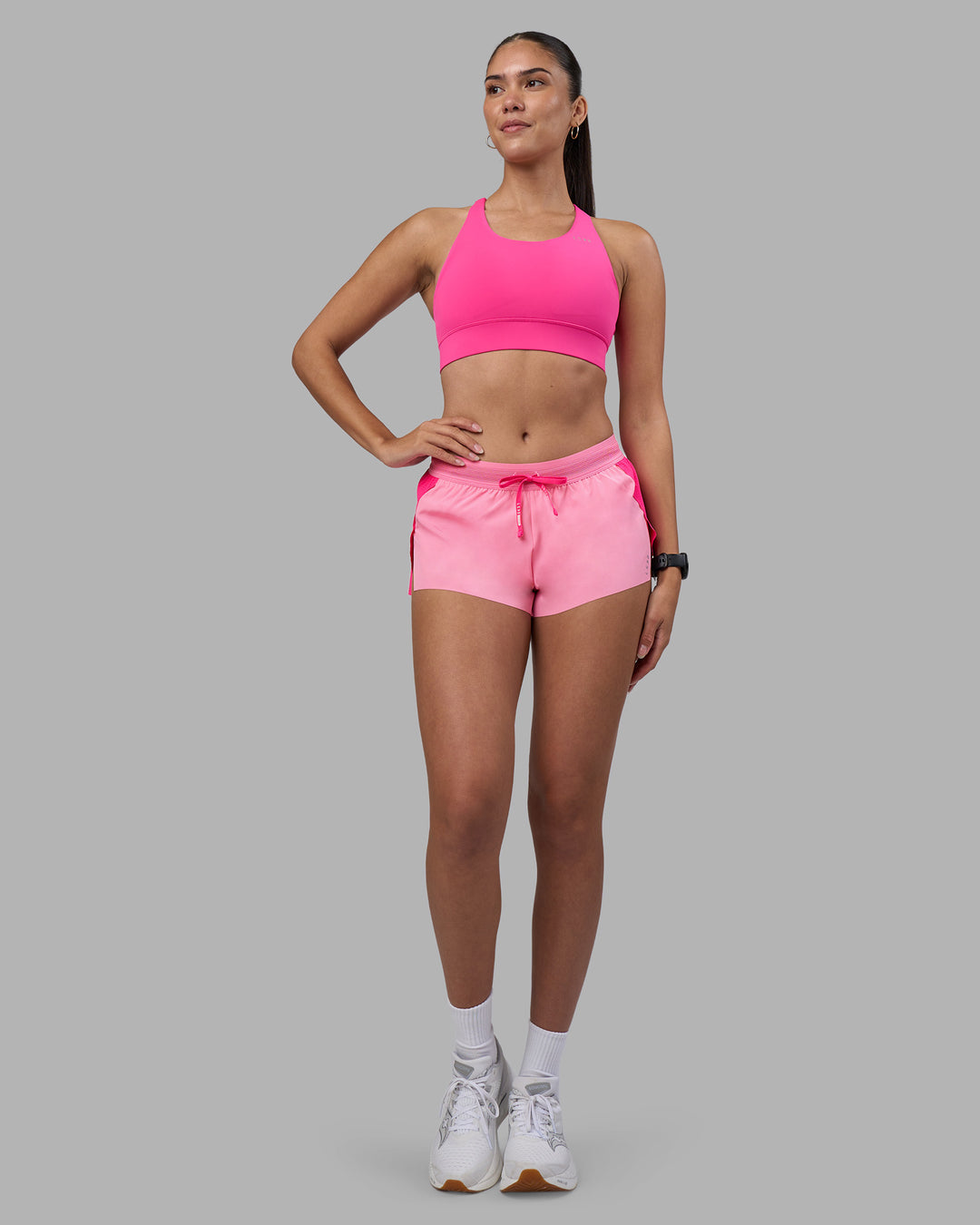 Woman wearing Accelerate 3" Running Short - Ultra Pink-Candy Pink | Model:Rhiley | Size:S