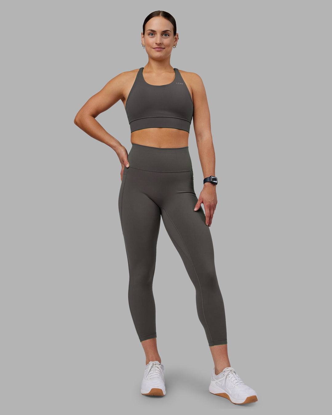 Woman wearing Accelerate Sports Bra - Dark Storm | Model:Keisha | Size:S