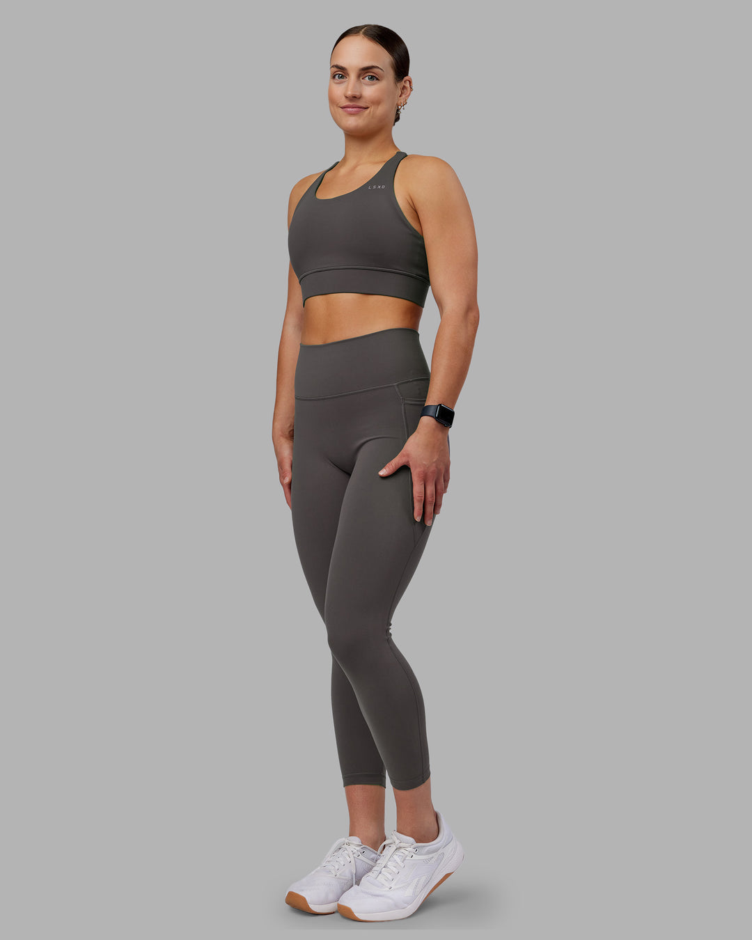 Woman wearing Accelerate Sports Bra - Dark Storm | Model:Keisha | Size:S