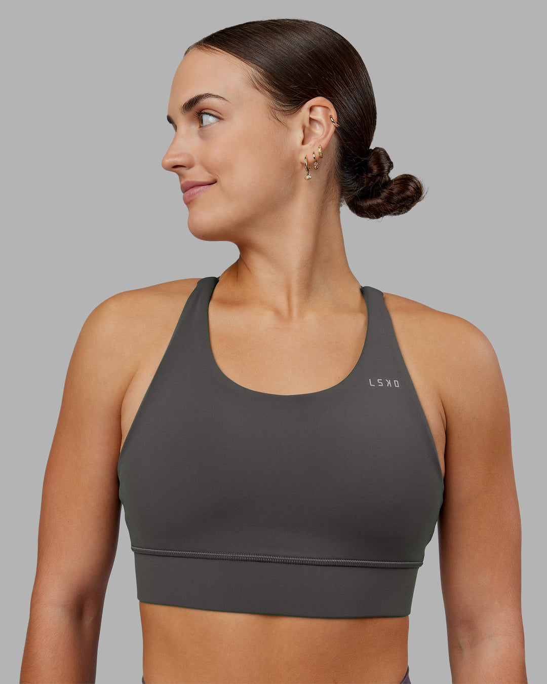Woman wearing Accelerate Sports Bra - Dark Storm | Model:Keisha | Size:S