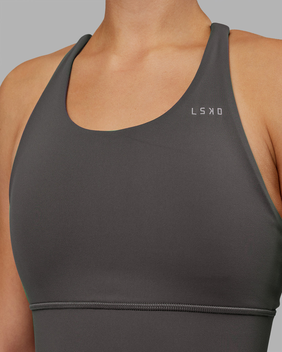 Woman wearing Accelerate Sports Bra - Dark Storm | Model:Keisha | Size:S