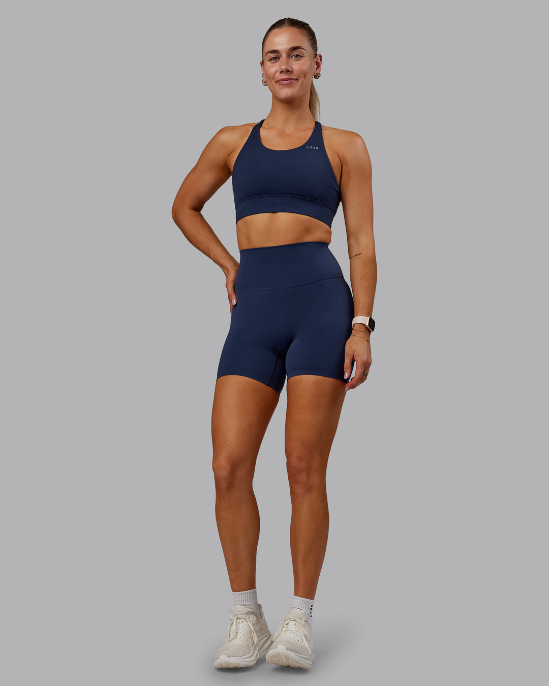 Woman wearing Accelerate Sports Bra - Future Navy | Model:Hannah | Size:S