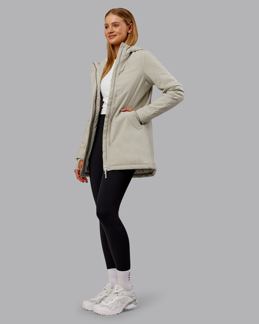 Woman wearing Auxiliary 2.0 Jacket - Shale Beige | Model:Ella | Size:S