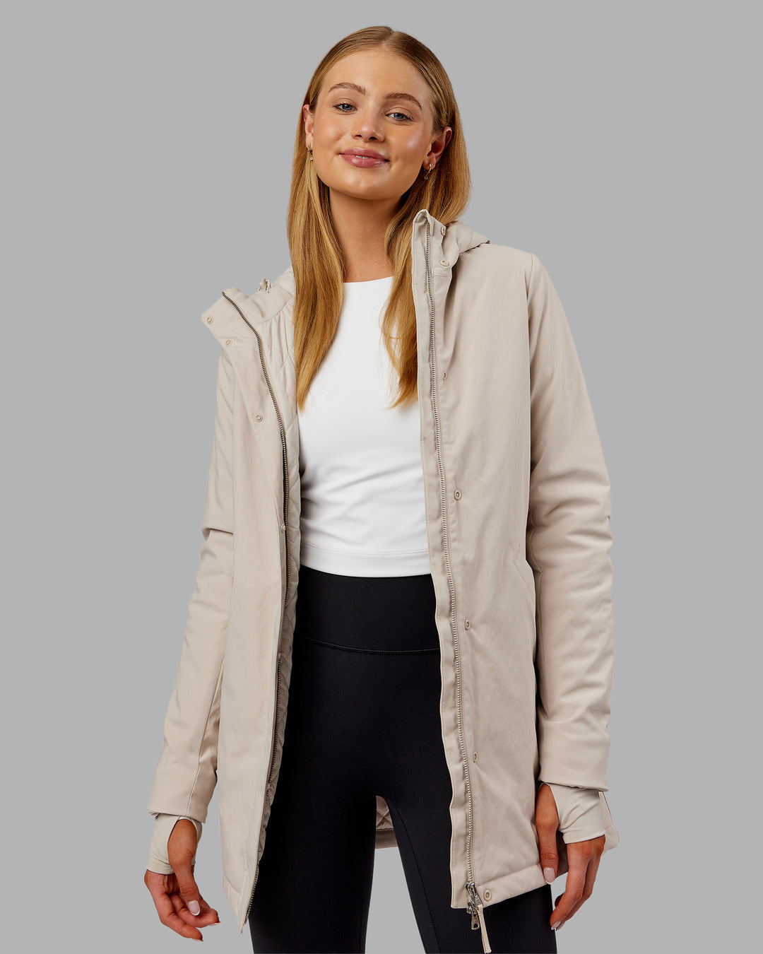 Woman wearing Auxiliary 2.0 Jacket - Shale Beige | Model:Ella | Size:S