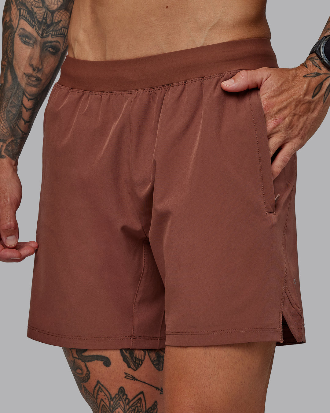 Man wearing Challenger 6" Performance Short in Mahogany | Size:S