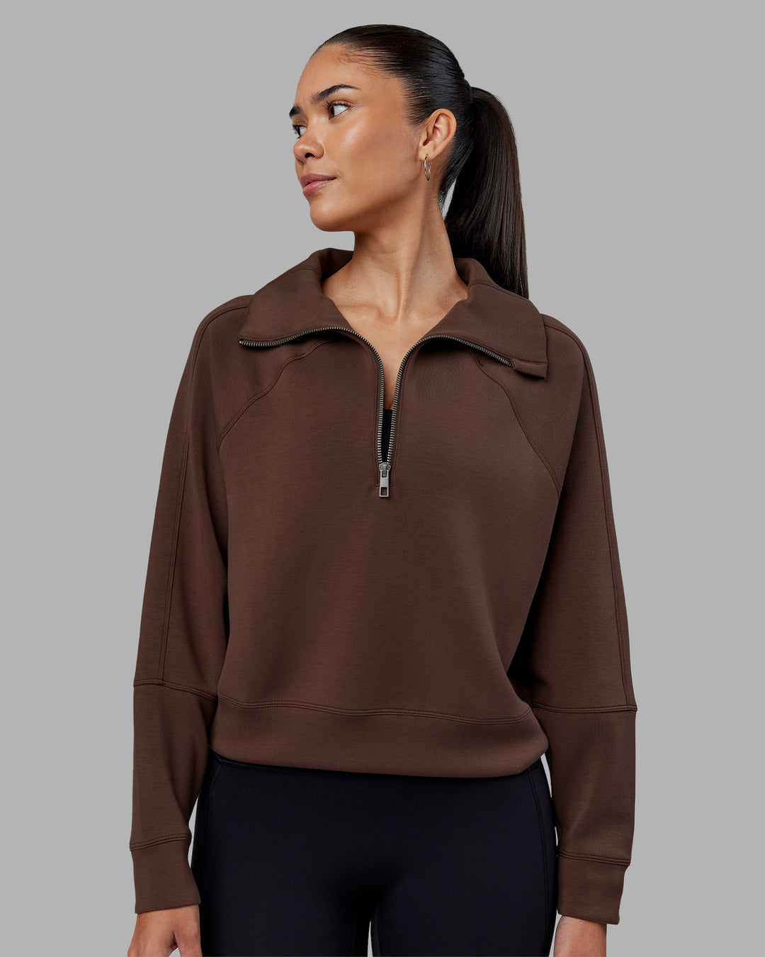 Woman wearing Elevate SoftTouch 1/2 Zip Sweater - Chocolate Martini | Model:Rhiley | Size:S