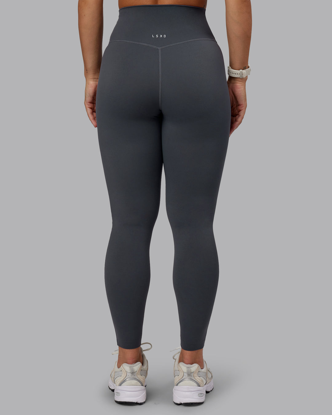 Woman wearing Elixir Ultra High-Rise Full Length Legging - Dark Storm | Size:S