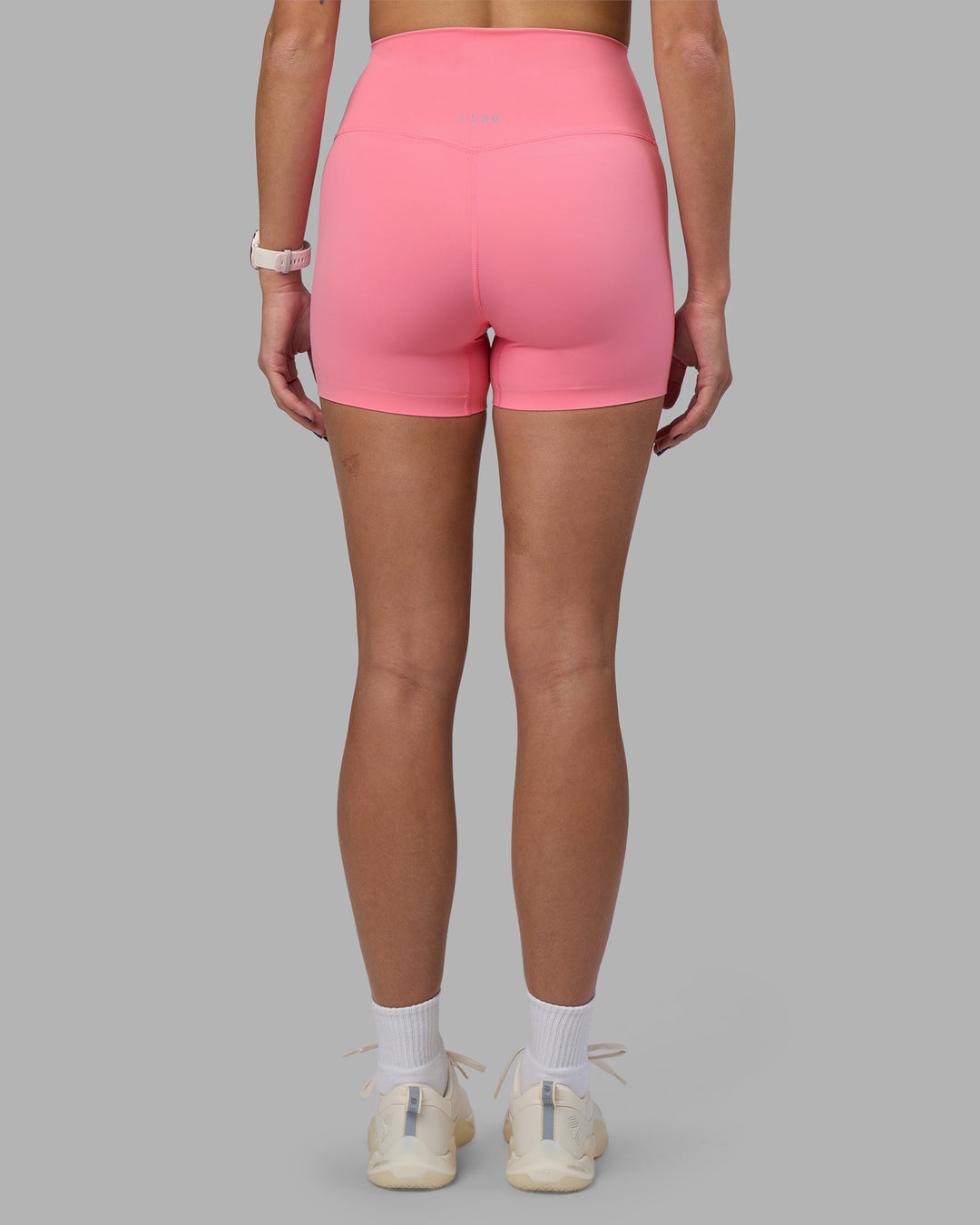 Woman wearing Elixir Ultra High-Rise 4" Short - Candy Pink | Model:Phoebe | Size:S