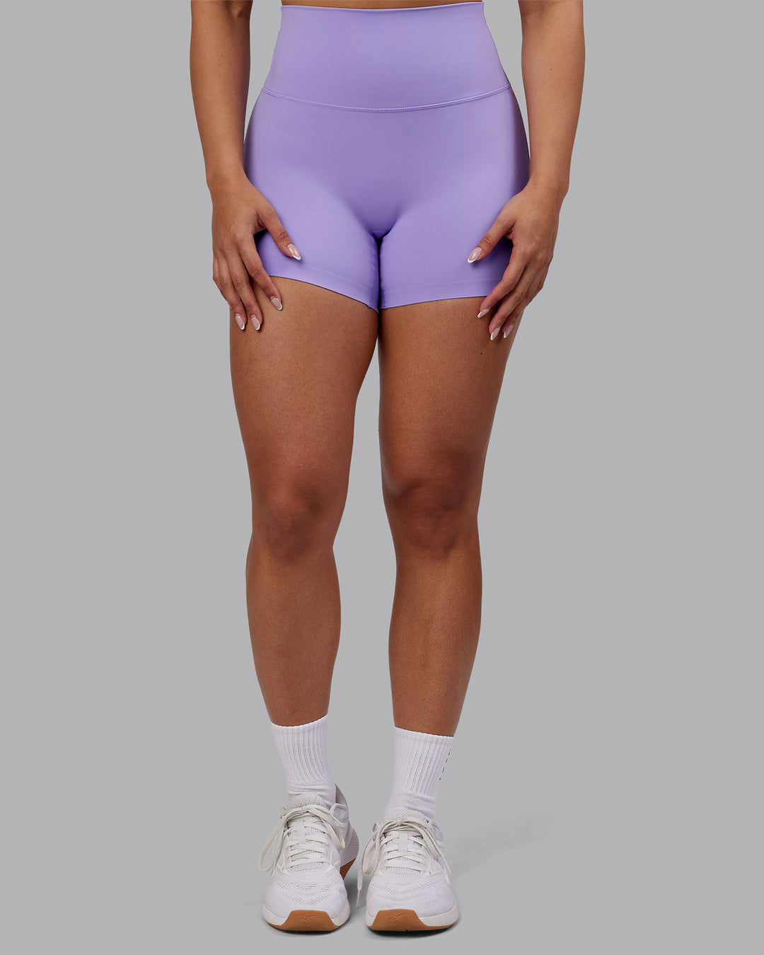 Woman wearing Elixir Ultra High-Rise 4" Short - Violet Ray | Model:Ayla | Size:S